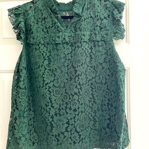 Green laced high neck blouse. Never worn in new condition.